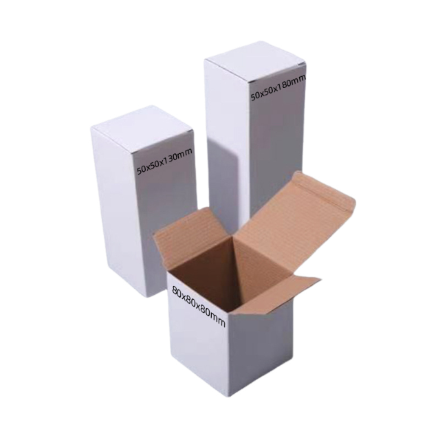 Custom white paperboard packaging boxes in multiple product sizes